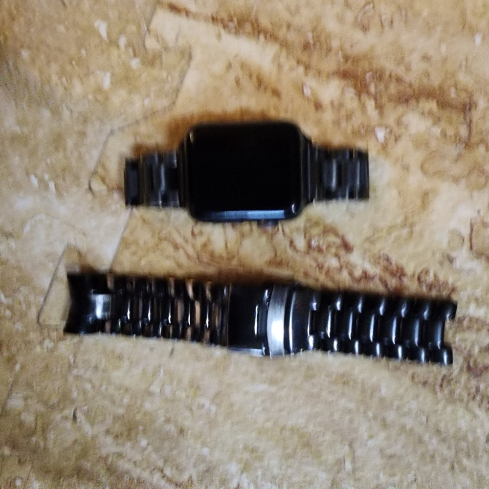 Iwatch - unlocked - 44 size face has rubber .band on it w/heavier band iincluded